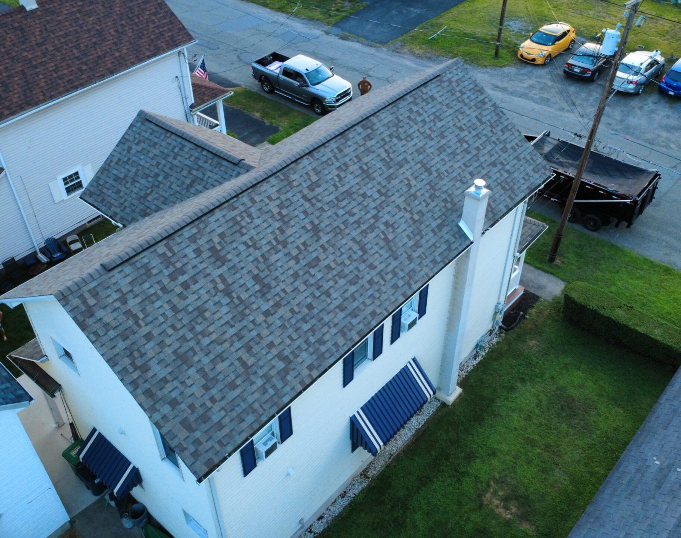 Professional Roof Repair in Duryea, PA fixing damaged shingles on residential roofing system