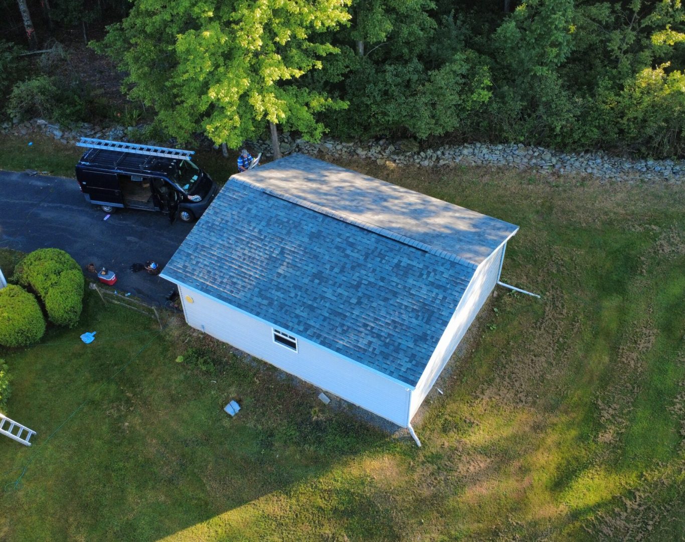 Professional Roof Repair in Swoyersville, PA fixing damaged shingles on residential roofing system