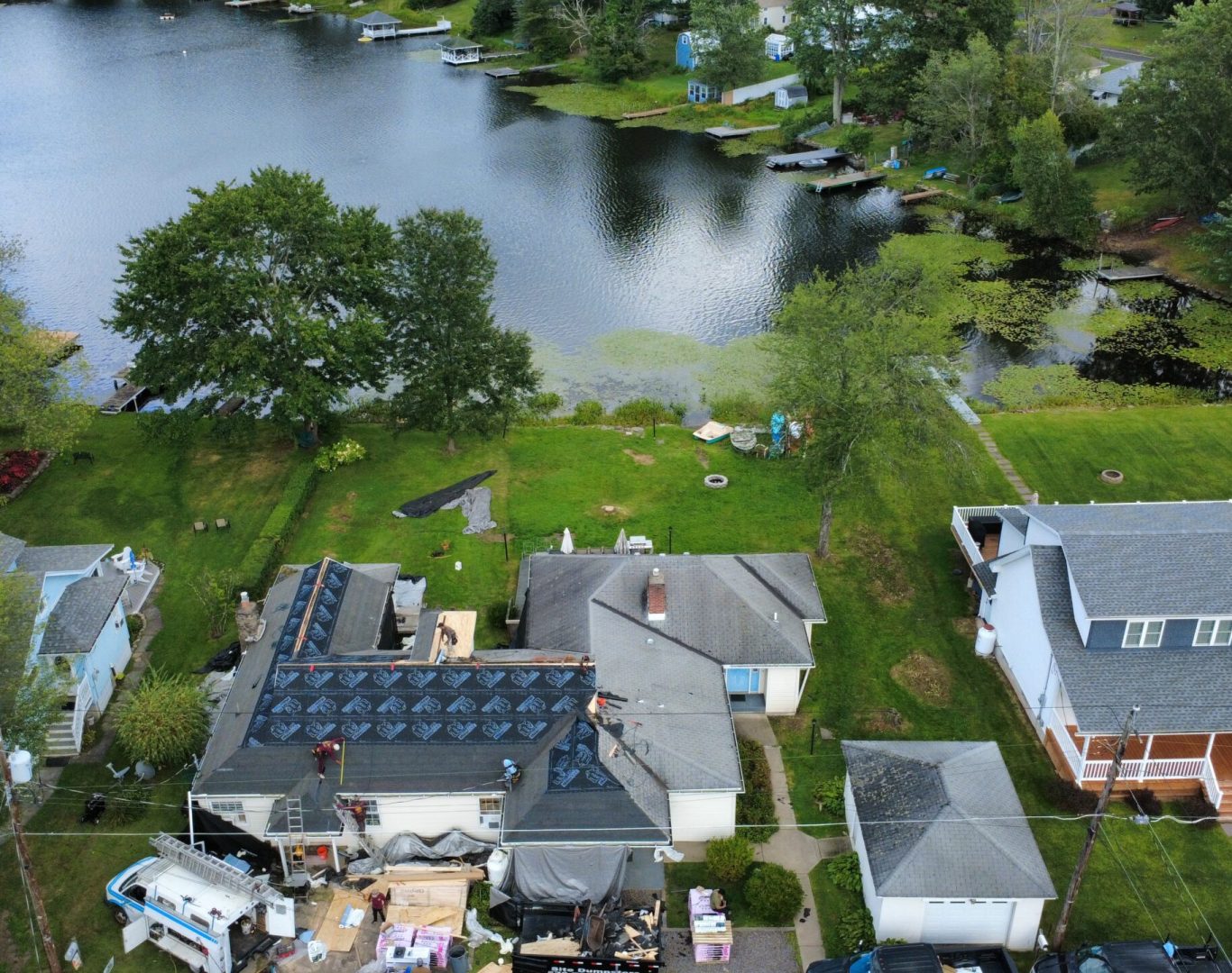 Professional Roof Replacement in Dallas, PA installing a durable new residential roofing system