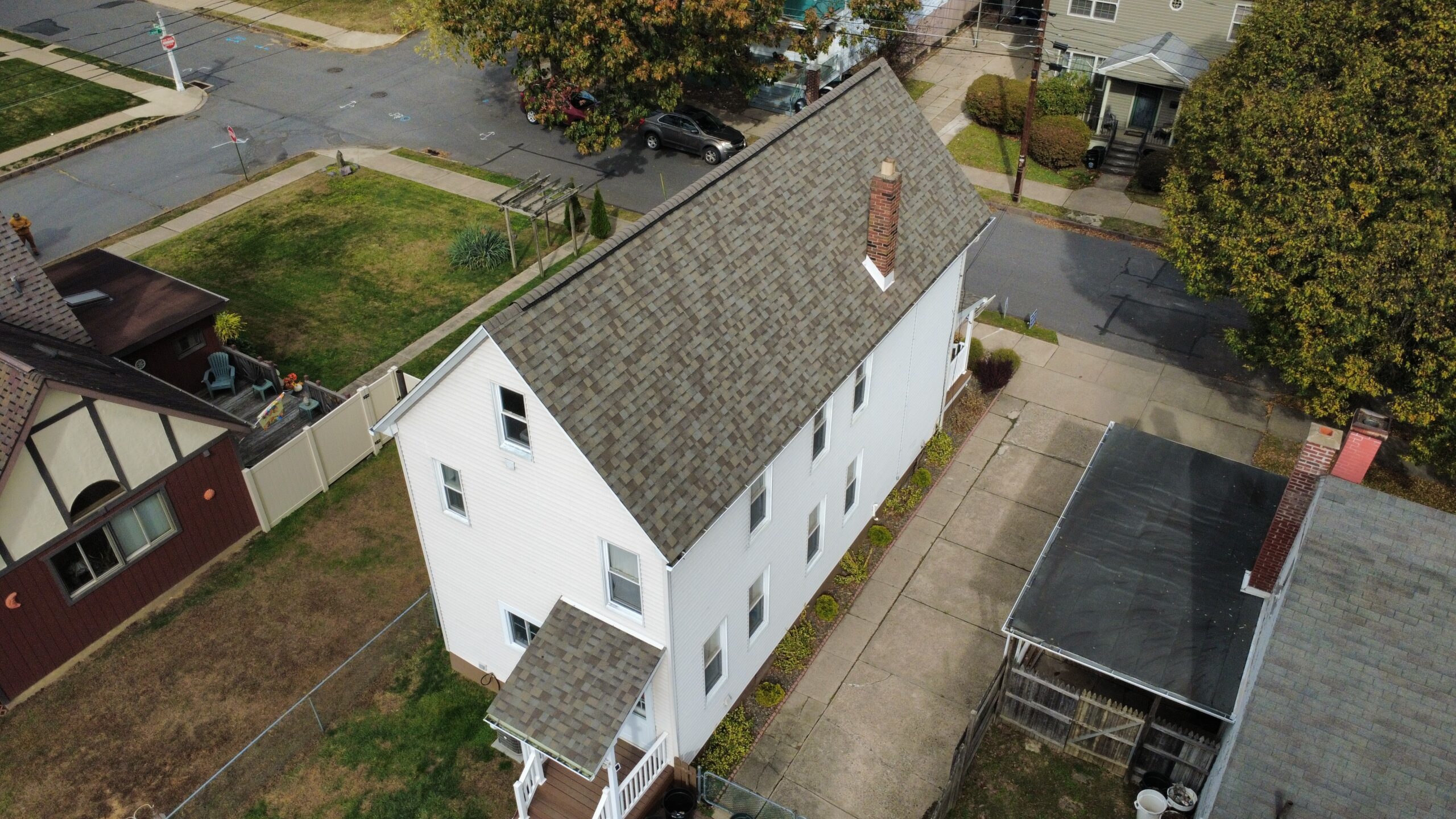 Professional Roof Repair in Clarks Summit, PA repairing damaged shingles on residential roofing system