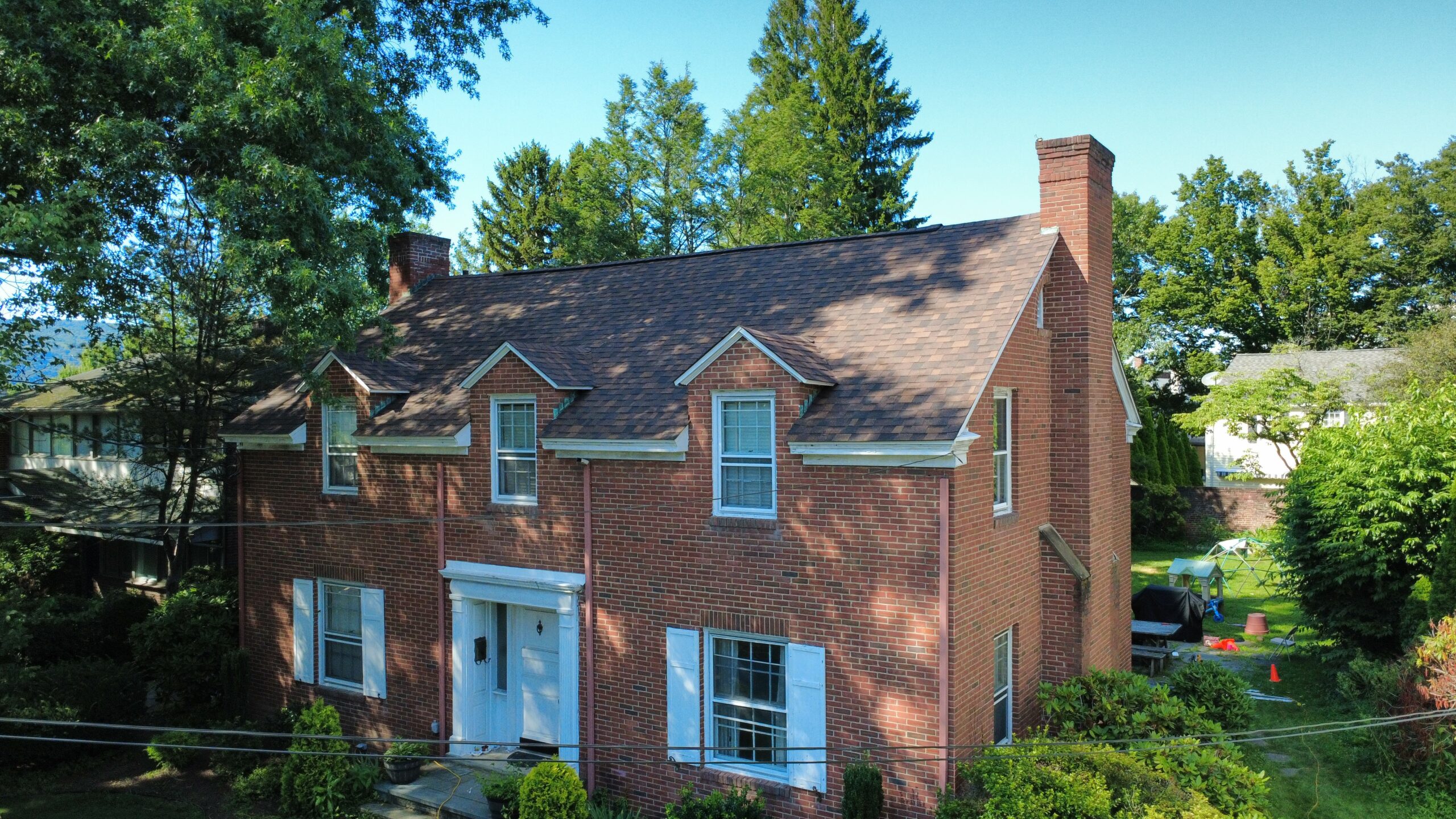 Professional Roof Repair in Pittston, PA repairing damaged shingles on residential roofing system