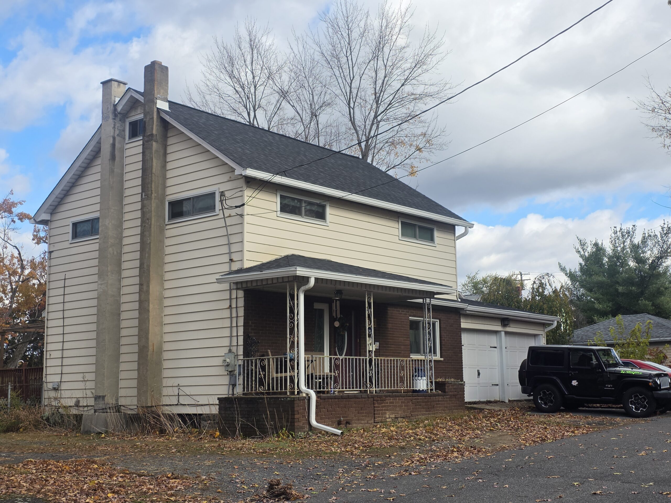 Professional Roof Replacement in Pittston, PA installing a durable new residential roofing system